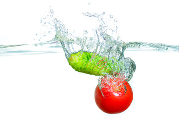 Dynamic Splash of Fresh Vegetables in Clear Water