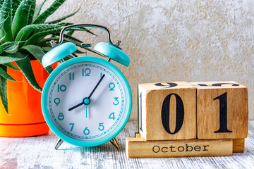 Wooden calendar with the date October 1.Monthly calendar for planning and management concept with...