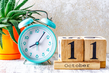 Wooden calendar with the date October 11.Monthly calendar for planning and management concept with...