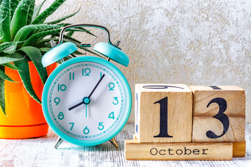Wooden calendar with the date October 13.Monthly calendar for planning and management concept with...