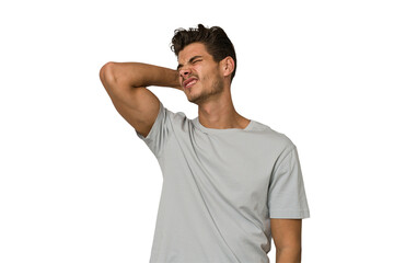 Young handsome caucasian man isolated on white background tired and very sleepy keeping hand on head.