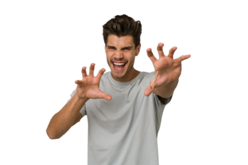 Young handsome caucasian man isolated on white background upset screaming with tense hands.