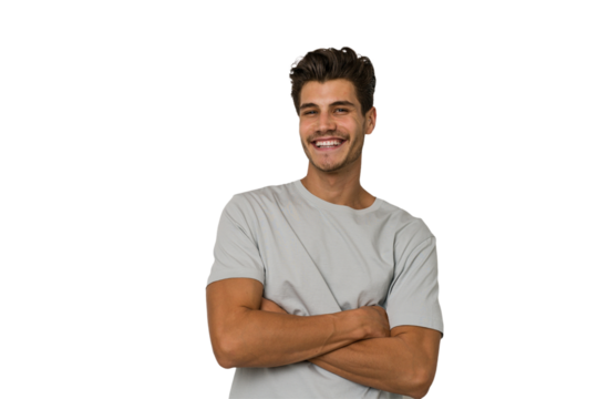 Young handsome caucasian man isolated on white background who feels confident, crossing arms with determination.