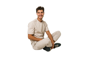 Young caucasian man sitting on the floor isolated on white background