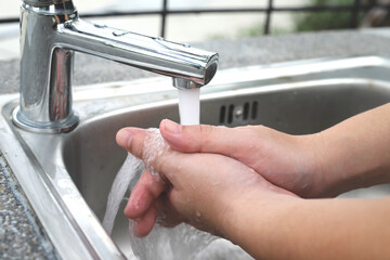 Wash your hands to clean germs.