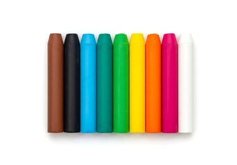 A row of colorful crayons standing upright against a white background