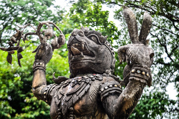 Old Thai Angel Statue, Symbols of Buddhism, Southeast Asia at Wat Chang Kam or Wat Kan Thom, Wiang Kum Kam Chiang Mai, Northern Thailand
