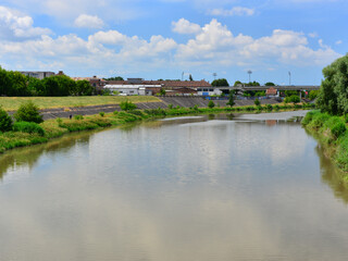 The Mures River flowing serenely on a summer day