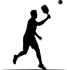 Silhouette of man playing pickleball action shot