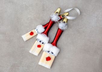 Flat lay of Santa made with paint brushes