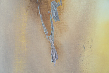 Abstract painting mixing gray and yellow colors creating original texture