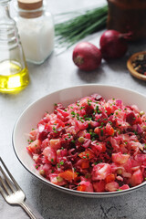 A bowl with Vinegret salad, a typical Russian dish	