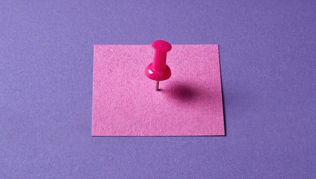 Pink pushpin in a square of pink sticky note on a purple background