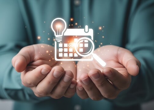 Hands holding calendar lightbulb and magnifying glass icons with glowing particles