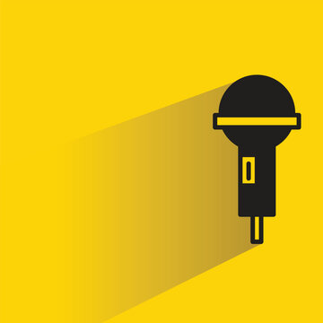 mic icon with drop shadow on yellow background