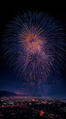 Gold and blue fireworks light up city skyline at night with space for text