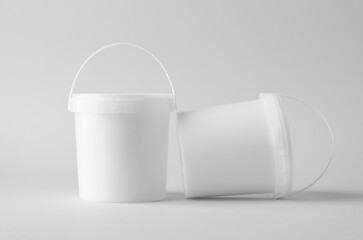Plastic paint or food bucket tub container mockup on neutral background