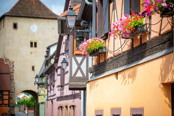Colorful houses line the streets of Alsace France in Beautiful Village 