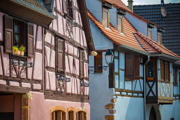 Colorful houses line the streets of Alsace France in Beautiful Village 