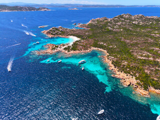 Isola Budelli. Arcipelago della Maddalena. Island Budelli. Sardinia, Italy. Beaches of Sardinia. Boats and yachts. Incredible colors and views. View from above. Drone view of Sardinia. Sea. Ocean.