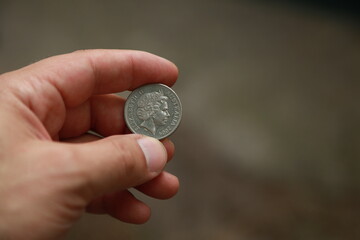 Australian change coin in hand
