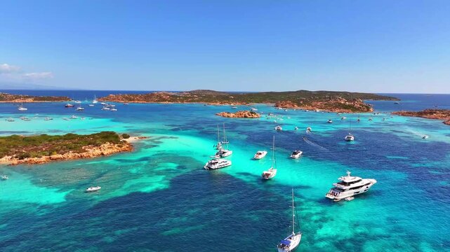 Isola Budelli. Arcipelago della Maddalena. Island Budelli. Sardinia, Italy. Beaches of Sardinia. Boats and yachts. Incredible colors and views. View from above. Drone view of Sardinia. Sea. Ocean.