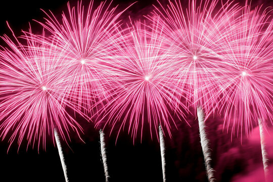 Strontium ignites vibrant pink fireworks in night sky