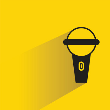 mic icon with drop shadow on yellow background