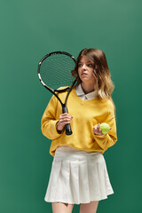 Bright summer day with a confident young woman ready to hit the tennis court