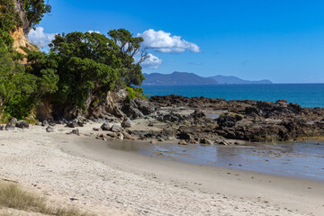 Rings Beach, Coromandel Peninsula, New Zealand. Rocks at north end of beach.
