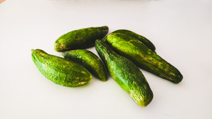 Fresh Organic Cucumbers on White Background