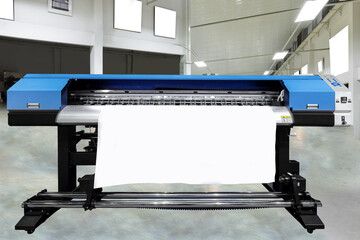 Large offset printing press or magazine running a long roll off paper in production line of industrial printer machine.