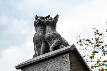 Tourist street with iron cat cats metal bronze statue Belarus.