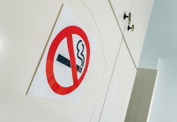 No smoking sign with crossed-out cigarette symbol, used to indicate smoke-free areas and promote...