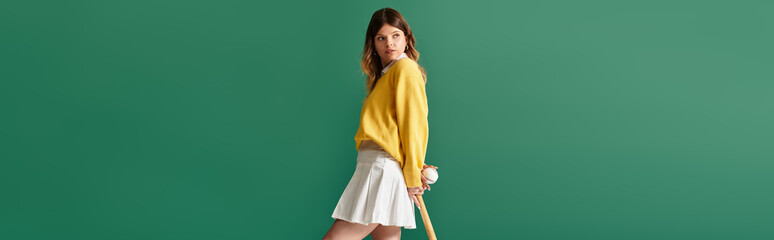 Young beautiful woman enjoying summer vibes with a playful outfit in a vibrant setting