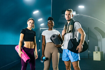 Gym buddies posing together after training session