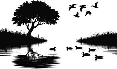 Black silhouette of a lone tree and ducks on a lake with birds flying overhead silhouette