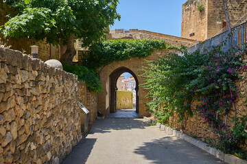 Arched entrance to Denia Castle in Spain