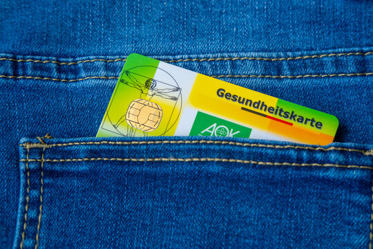 German health insurance AOK card Gesundheitskarte in jeans pocket, Healthcare system, medical services in Germany, Personal identification for medical appointments and prescriptions