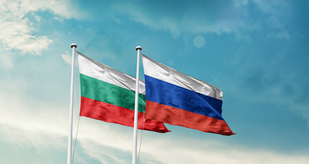 Bulgaria and Russia friendship flags are waving in the sky. Double country Flag waving with mast....