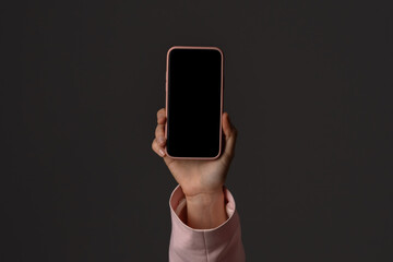 Hand Holding Smartphone with Blank Screen in Pink Case
