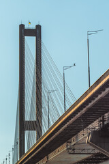 Southern Bridge in Kyiv, Ukraine, against clear blue sky