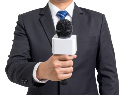 A person in a suit and tie holding a microphone with a blank white mic flag, ready for an interview or broadcast.