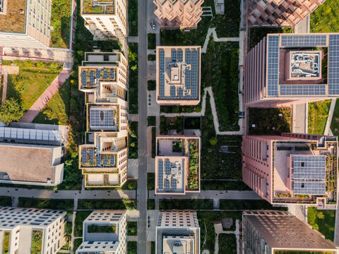 Aerial view of the The Paris 2024 Olympic and Paralympic Village with solar panels and green roofs intermingle with lush green spaces, Saint-Ouen-sur-Seine, &Atilde;Žle-de-France, France.