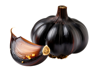 Close up of a whole head of black garlic and a single clove separated, against a black background.  The garlic is dark purplish-black, with visible texture and details on the cloves.  The single