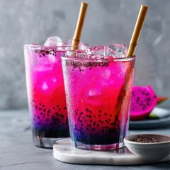 Refreshing dragonfruit iced tea with chia seeds served in clear glasses, garnished with bamboo straws, showcasing vibrant colors and ice, perfect for summer hydration and enjoyment