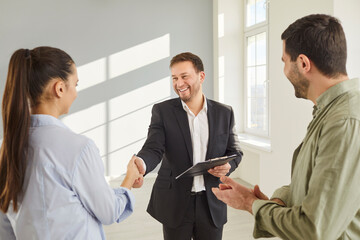 Realtor man meets couple to deal, happy male licensed real estate agent, salesperson advertising...