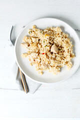 Chicken and rice dish seen from above