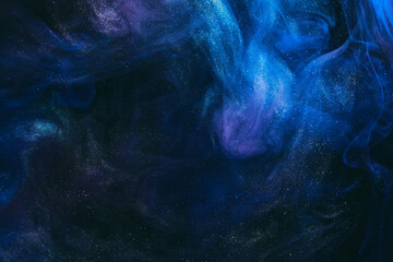 Abstract colorful smoke background. Moving flow of blue paints, fluid art