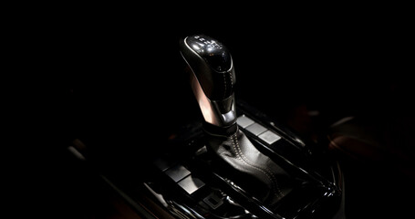 EV Car gear. Close up of modern automatic car gear shifters in luxury vehicle interiors. Feature...